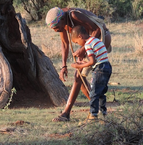 Trackers reading footprints in the field